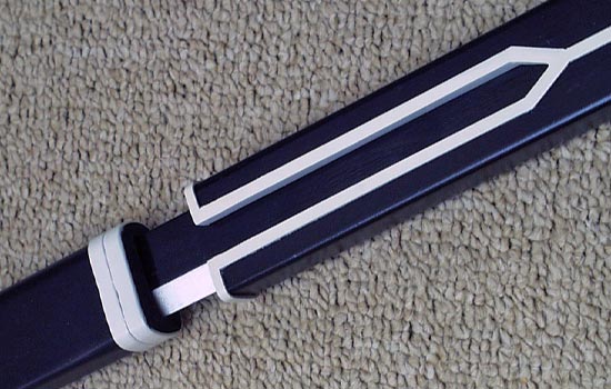  Sword in scabbard. 