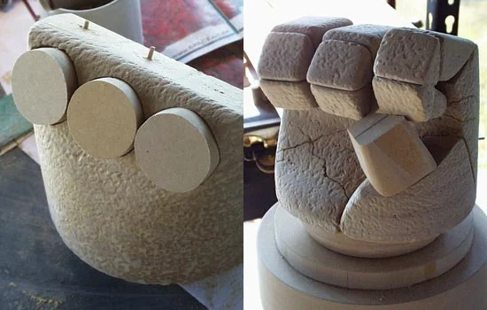 Texture added to the hand. With the hand texture done, it was time to tackle the disk-shaped knuckle plates. Since the back of the hand is rounded, I had to cut holes for the disks to sit into.