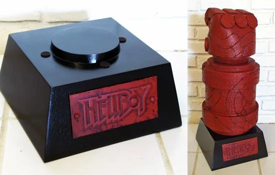 The final base. It was textured with shellac applied with a sponge and then painted black. I also added some felt bumpers to the top to protect the finish on both the base and hand.