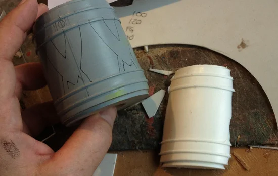 Since this band has a repeated pattern, I decided to cast a portion of the band and apply the decoration to it. This completed section would be molded and multiple resin copies would then be applied to the full basswood master.