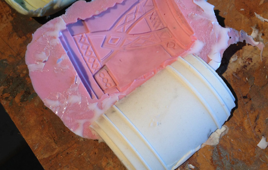  I made a mold of this pattern piece (the pink one) and a silicone positive (the white one) of the band section. 