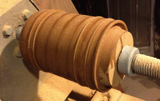  The end band was too big for basswood so I glued a bunch of MDF together and shaped it on the lathe. 