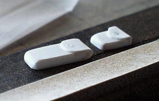 The belt pouches were made from thick styrene with thin plastic folded over for the flaps, I put a dot of CA glue on the flap for a subtle button.