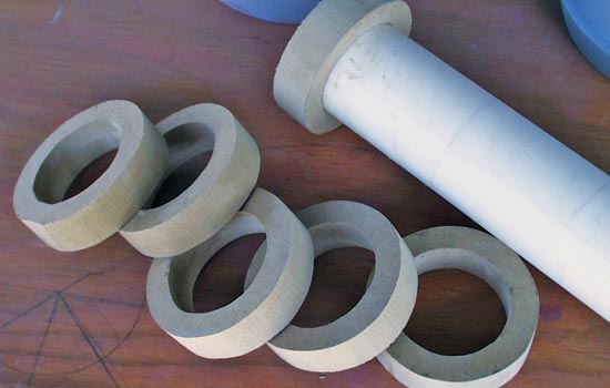 Stormbreaker has 3 rings at the point where the handle meets the head. I cut 2.5″ disks from MDF and then cut 1.75″ holes in them.