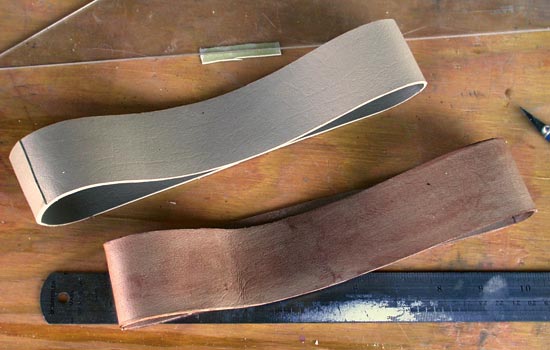 Here you can see the lamination and the extra overlap that I included at the spot where it gets attached to the hammer. I stained the vinyl with acrylic Burnt Sienna and black washes to get a more realistic leather.