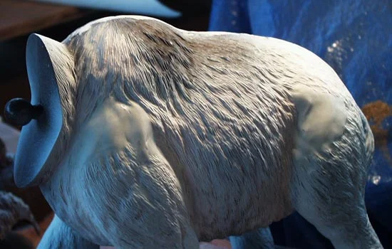 Even with the seam covered, it still looked like a toy. I researched elephant muculature and built additional mass to the hips and shoulders.