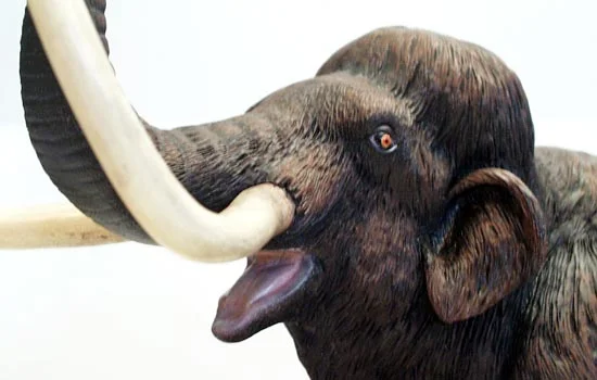 I based the painting of the mouth and trunk opening (?) on those of modern elephants, making them a pale greyish pink. The tusks were weathered with multiple washes and the eyes were painted to match a modern elephants (strange, I know).