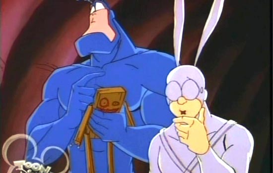  The Tick, a large, blue, strong but stupid and INSANE superhero, is upset that his sidekick Arthur wants to skip “Craft Night”. Sulking in his apartment, the Tick sees “a little boy trapped in a block of wood” and decides to free him. 