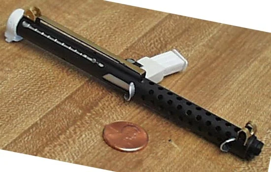 Here is the completed body of the gun. It has a 1/8″ brass barrel, the muzzle is laminated styrene and the bolt handle is a VERY tiny nail.
