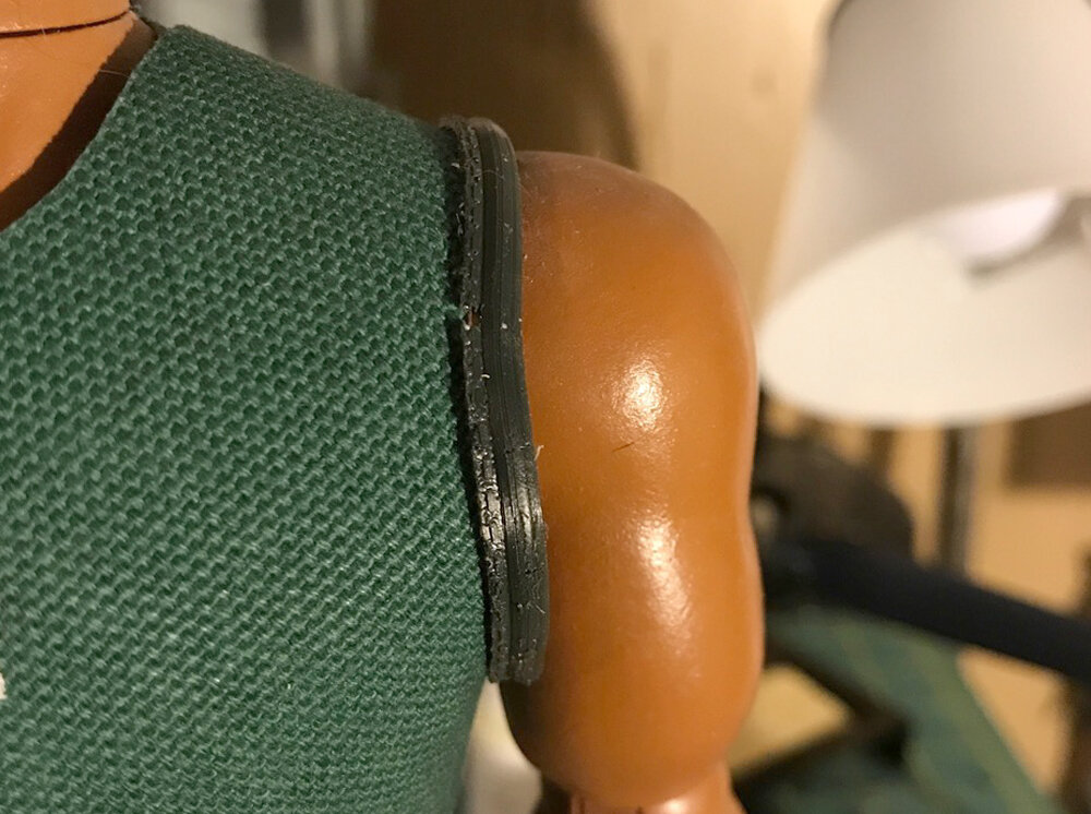  I solved the vest trim issue by sculpting the trim and stitching, printing and molding it in Smooth-On Kytoflex 30 Urethane rubber. This was glued to the edge of the vest. 