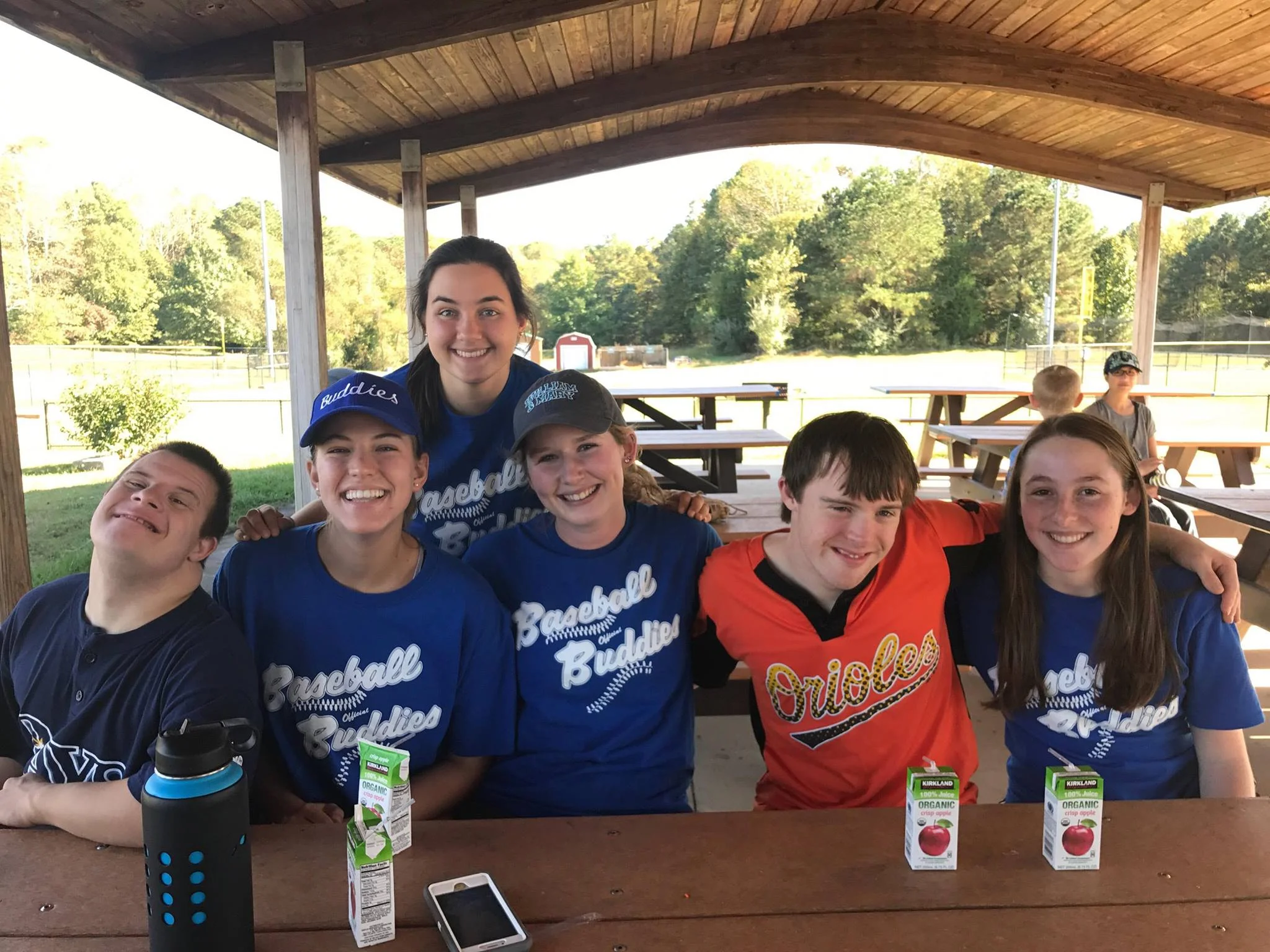 Some members of APO relaxing after a seriously fun game of Baseball with some buddies!