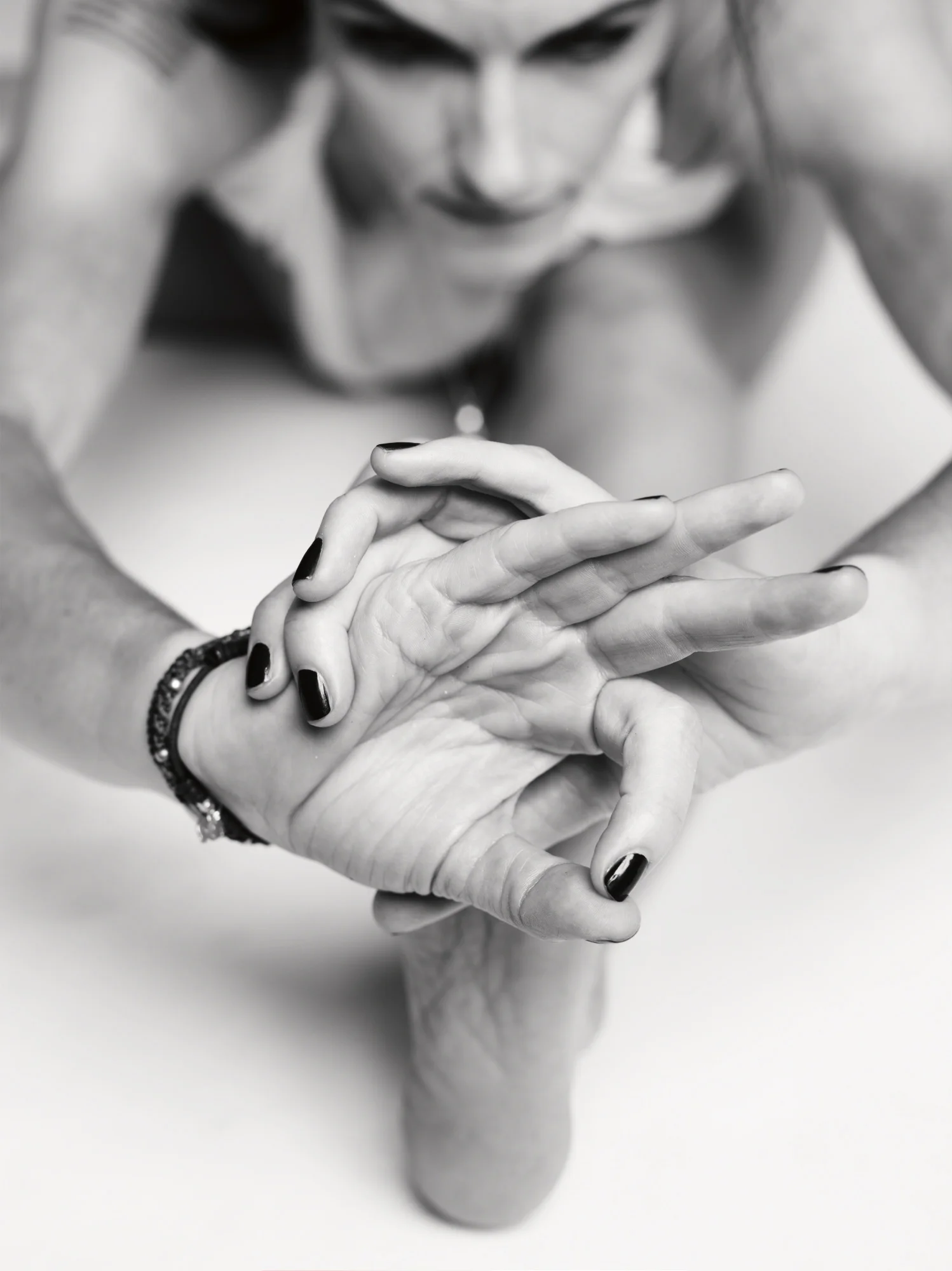 Yoga and religion by Greg Nardi. Mudra and Mala - Kia Naddermier photographed by Jan Welters