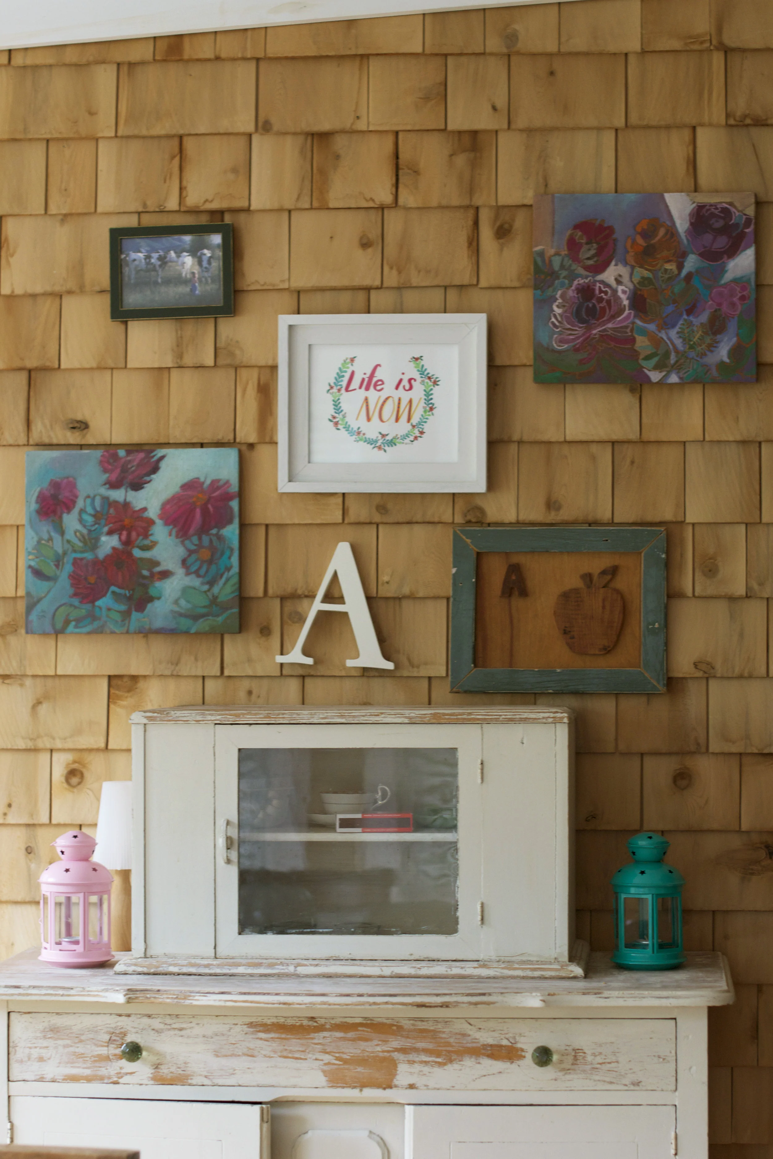 cedar-sided-dining-wall-with-artwork.jpg