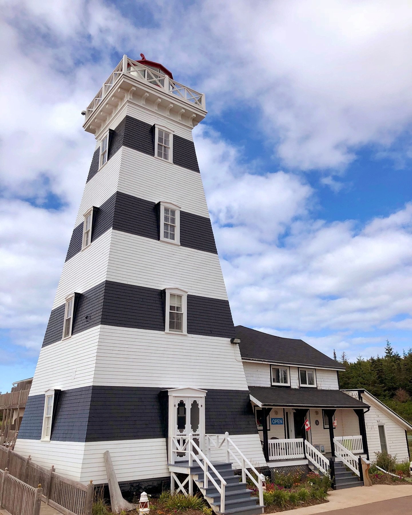 Embark on an enchanting journey where maritime history meets modern comfort at the West Point Lighthouse Inn &amp; Museum. (See Link 🔗 in Bio) Situated along Prince Edward Island&rsquo;s picturesque North Cape Coastal Drive, this beacon of hospitali