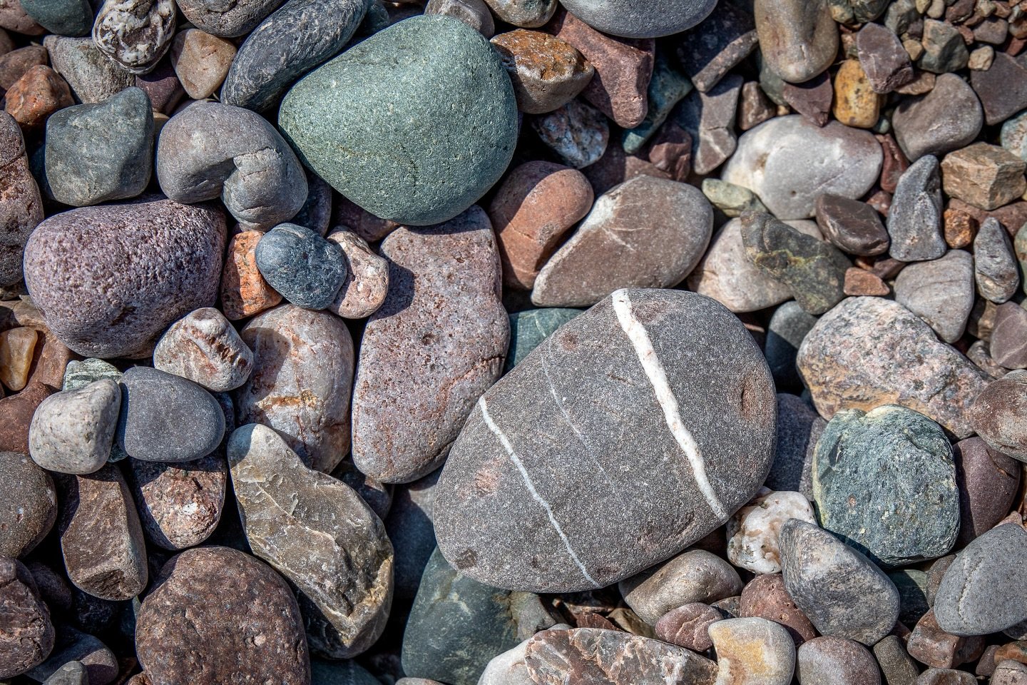 Treasure your time in Fundy-St. Martins, then before you leave take one last walk on the beach and hunt for a wishing stone. Keep an eye out for rocks that have an unbroken line all the way around. The stripe is usually quartz or calcite. When you fi