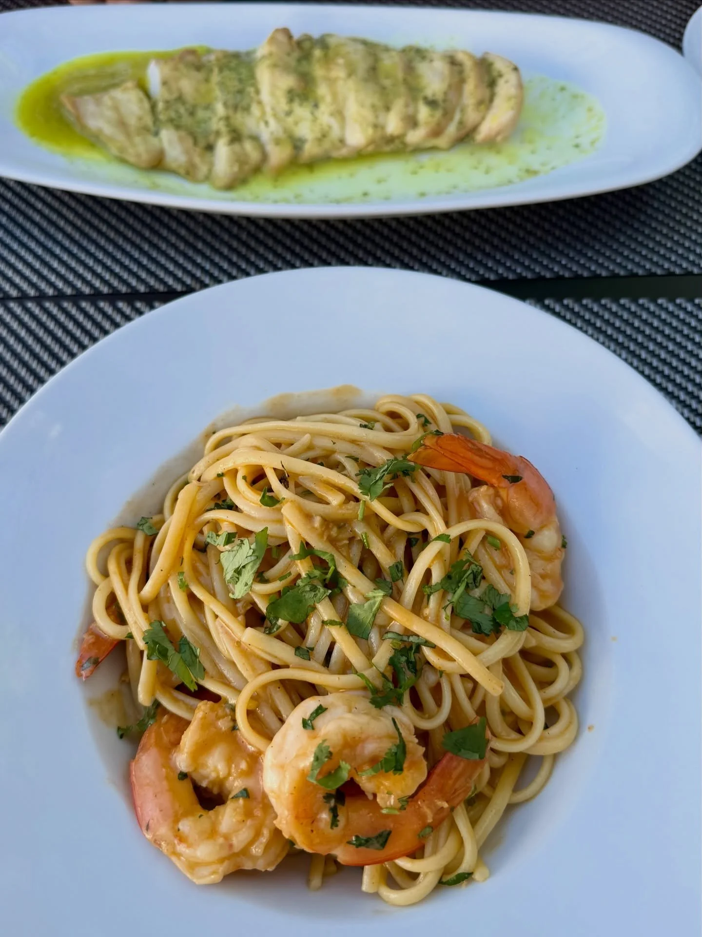 After a tall signature drink at @cafe.paris.sintra&hellip; we just couldn&rsquo;t resist &amp; lingered for a meal.

I went for the shrimp linguine&mdash;tender shrimp in a garlicky, olive oil&ndash;forward sauce. My husband&rsquo;s choice? Pan-seare