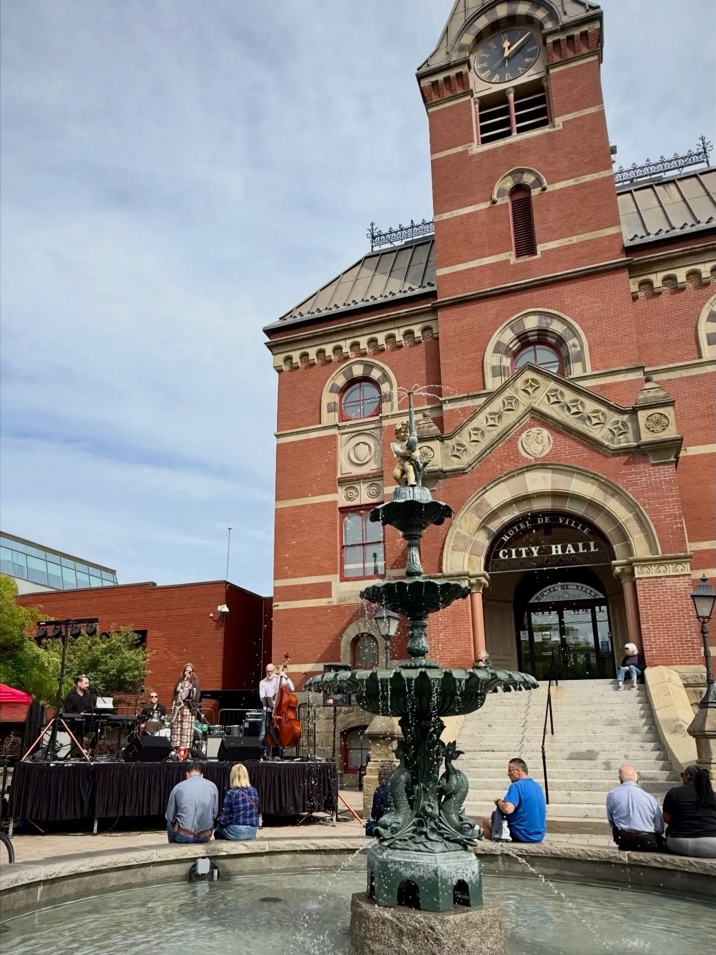 Do you ever just wander @downtown_fredericton in the afternoon during @harvest_music_fest afternoons taking in the colourful window art, listening to musicians and buskers warming up for the evening, and watching the city slowly come to life? 💜🎷

T
