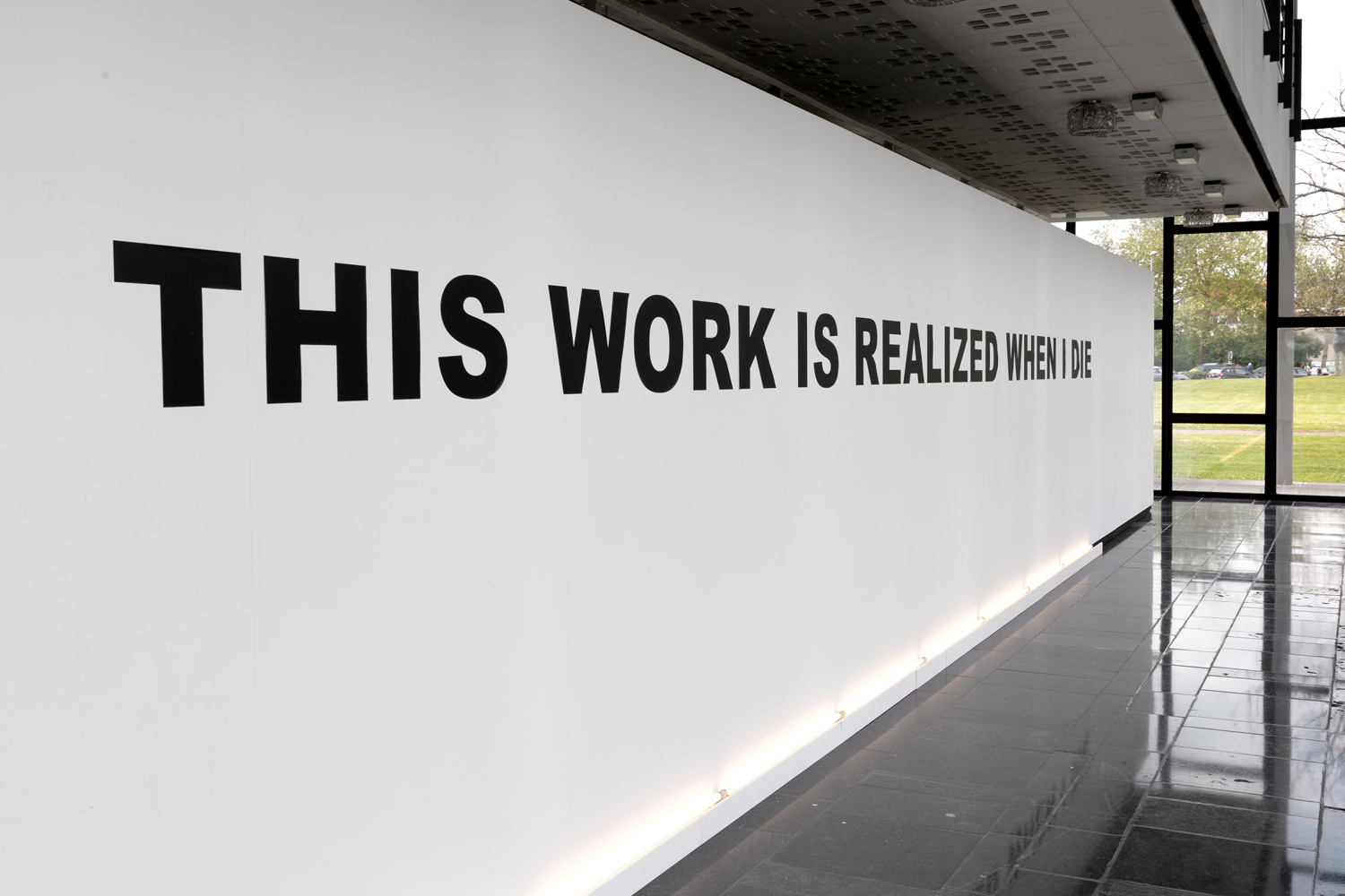 Stefan Brüggemann, ‘This work is realized when I die’, 2013, Vinyl, 3,8x13m, black vinyl letters, Courtesy of the artist and gallery Hauser Wirth