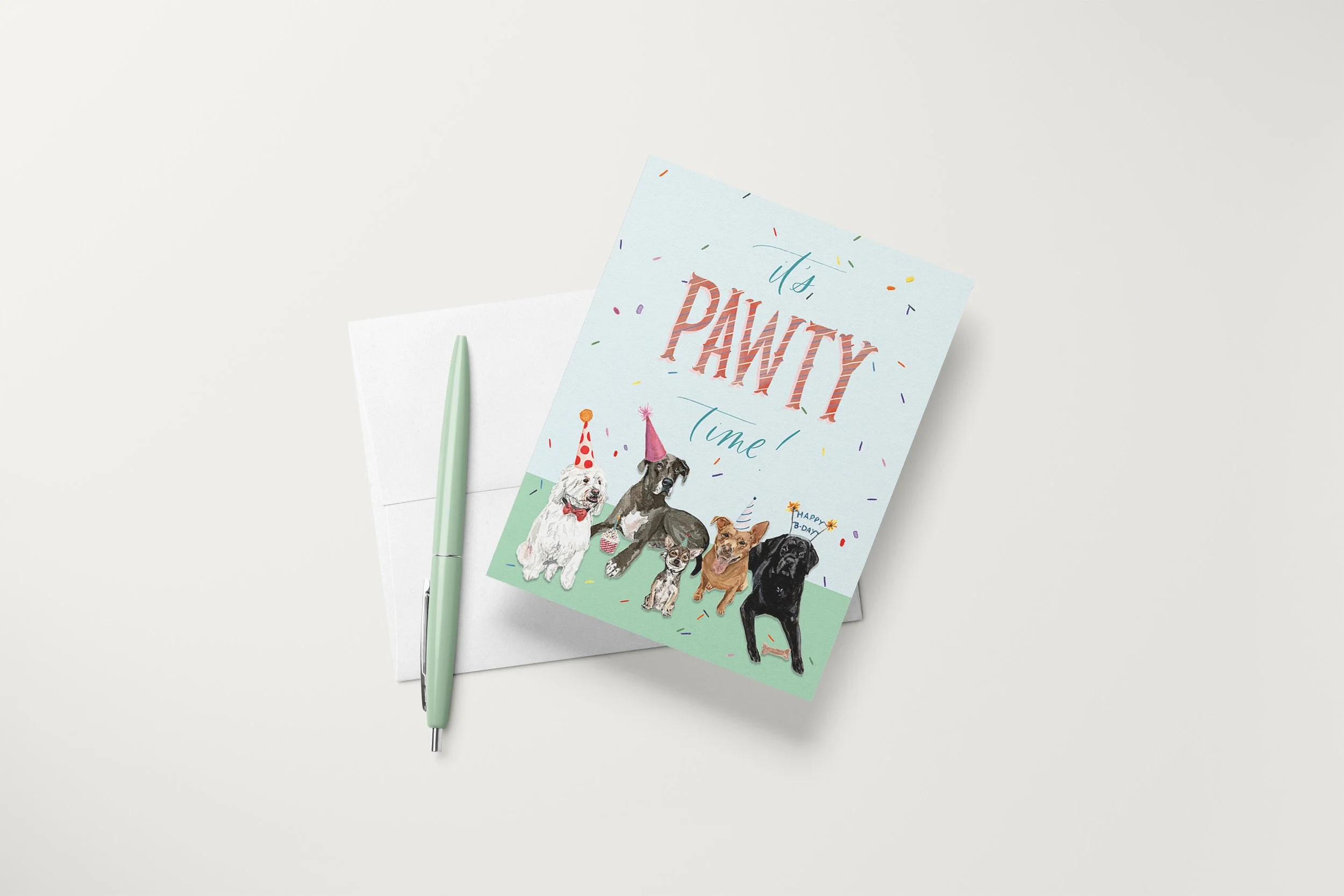 Pawty Time Dogs Card Mock with pen.jpg
