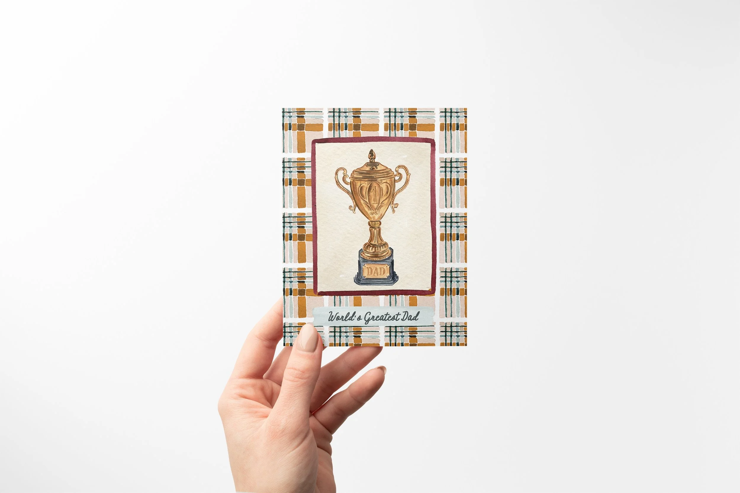 Greatest Dad Trophy Card Mock with Hand.jpg