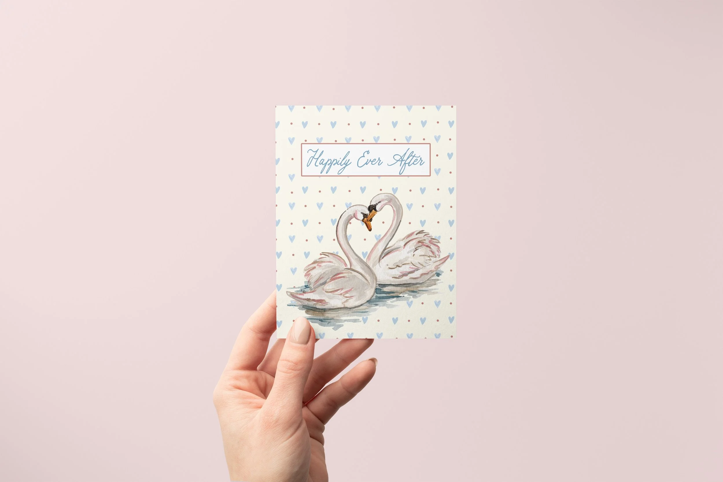 Happily Ever After Swans Card Mock with Hand.jpg