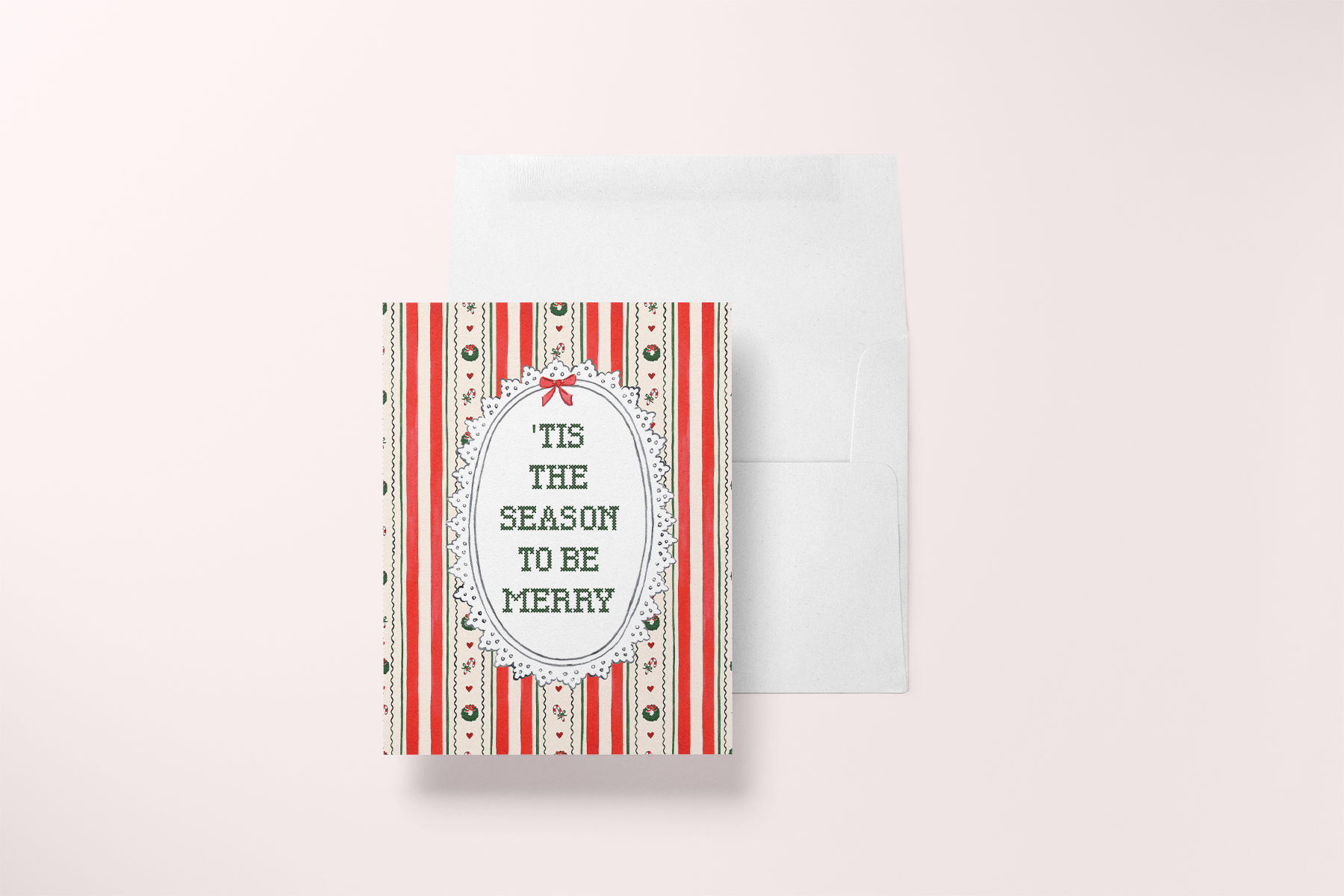 Vintage-style Christmas card reading 'Tis the Season to Be Merry with envelope