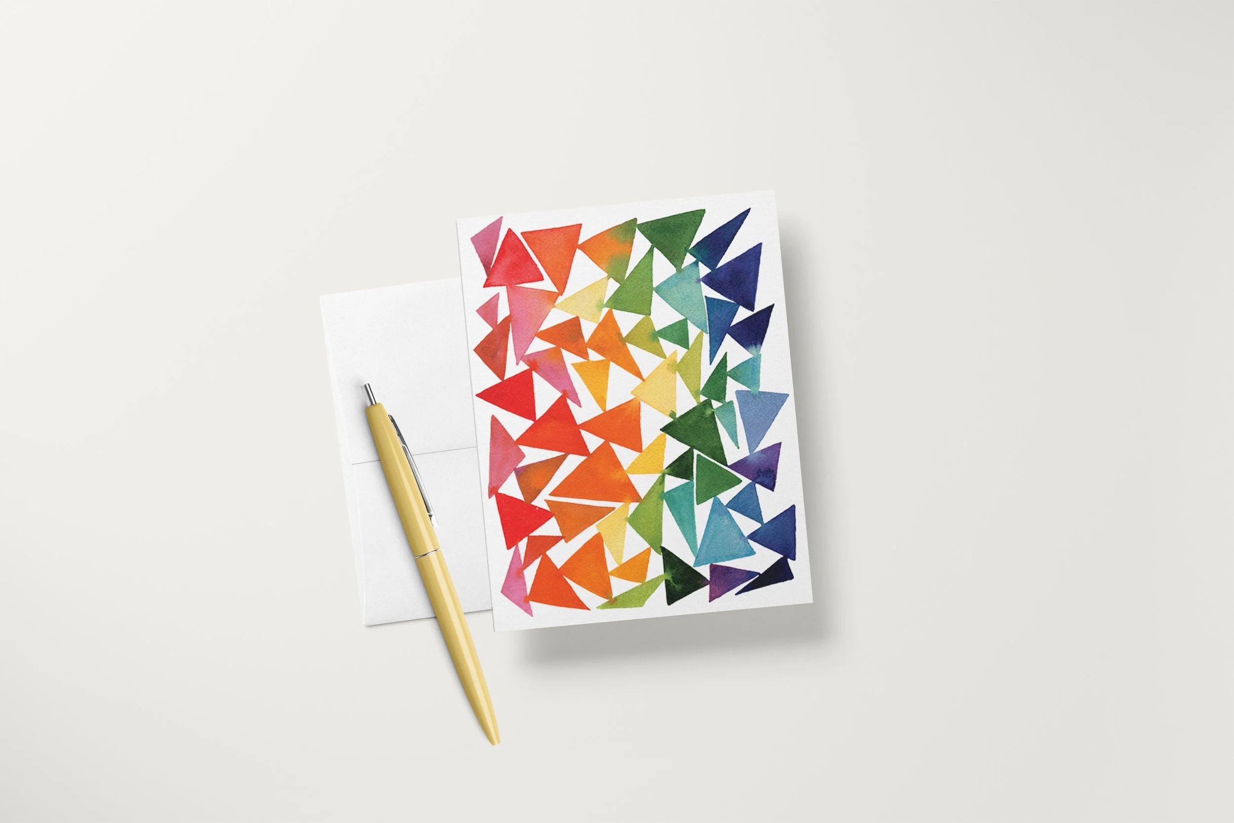 A2 Rainbow Triangles Card Mock with Pen.jpg