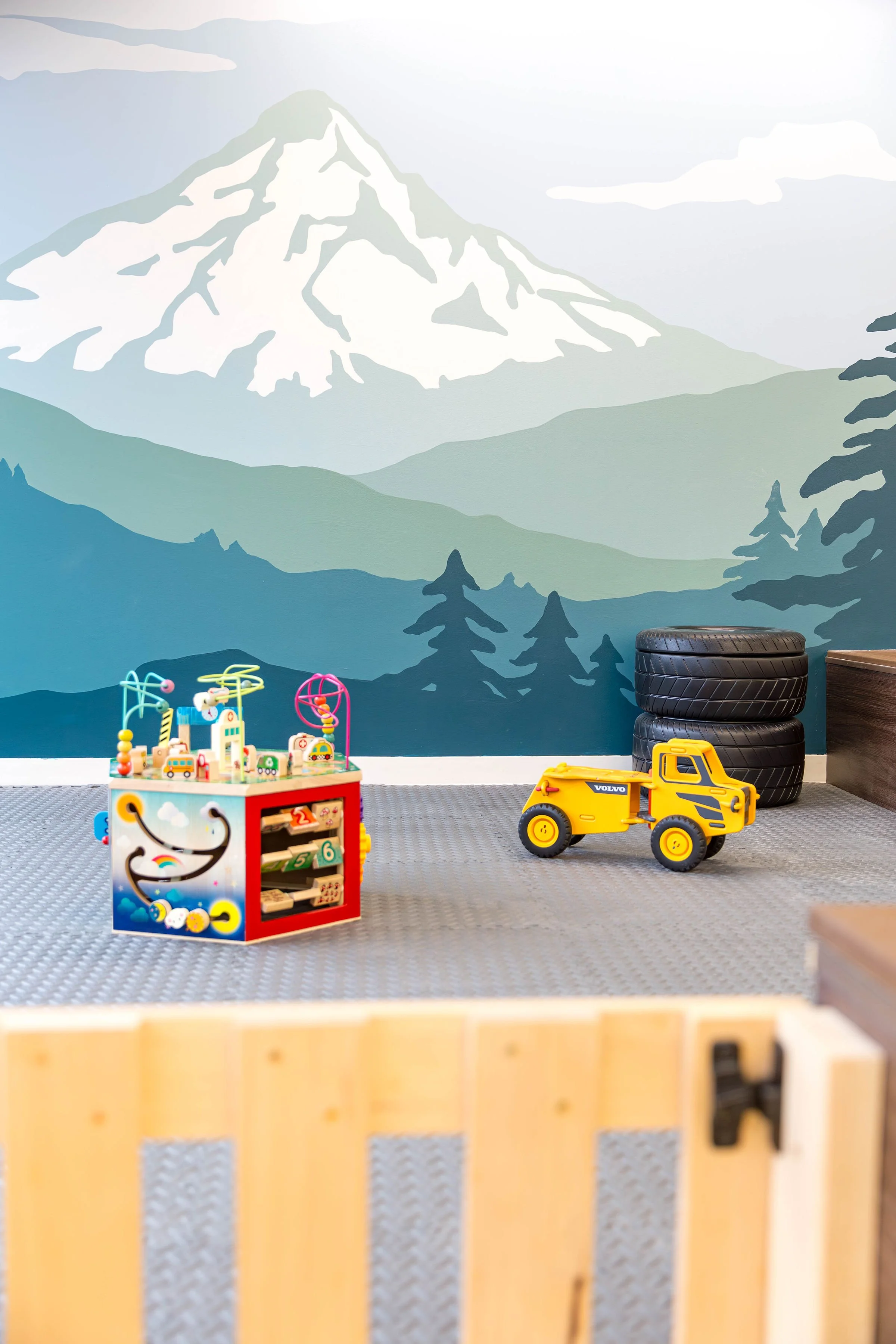 Mural of a mountain painted in soft tones at Dig PDX by Oregon artist Amanda Donahue of The Scribblist