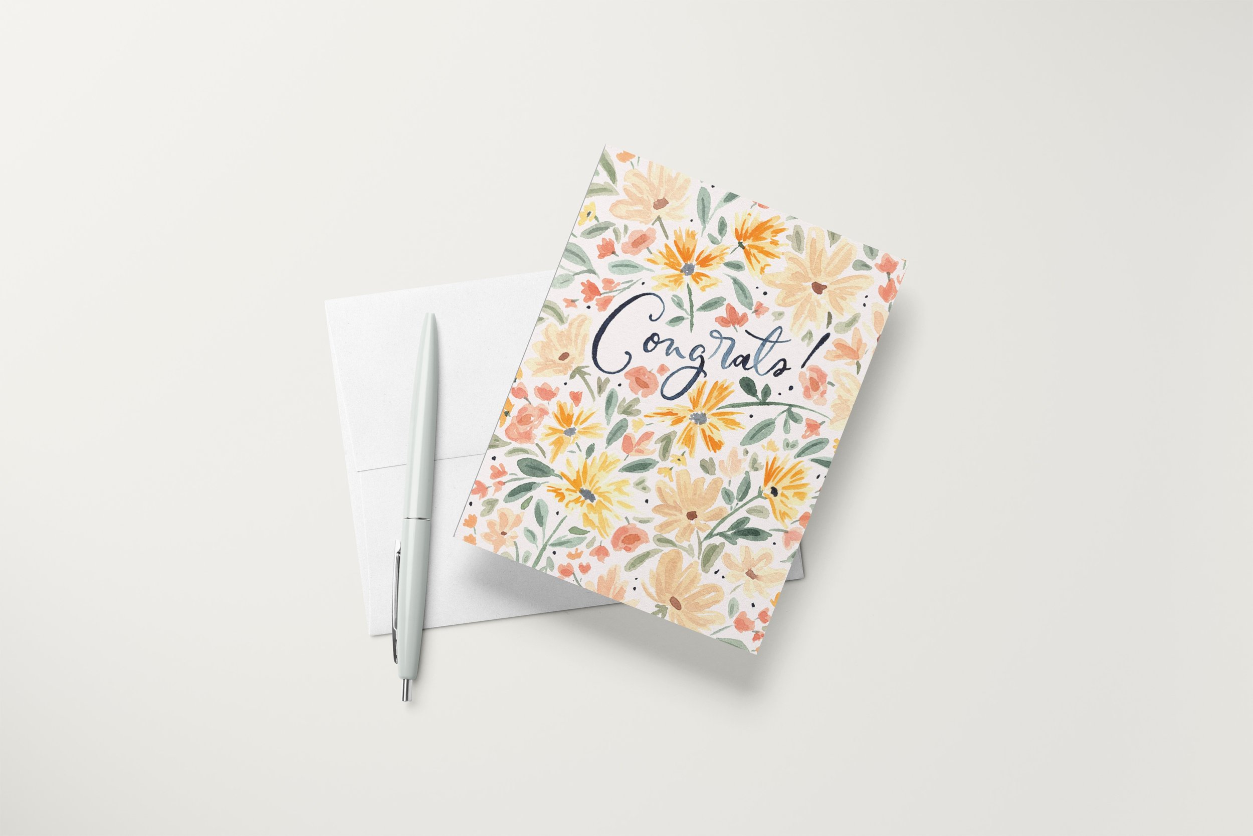A2 Floral Congrats Card Mock with Pen.jpg