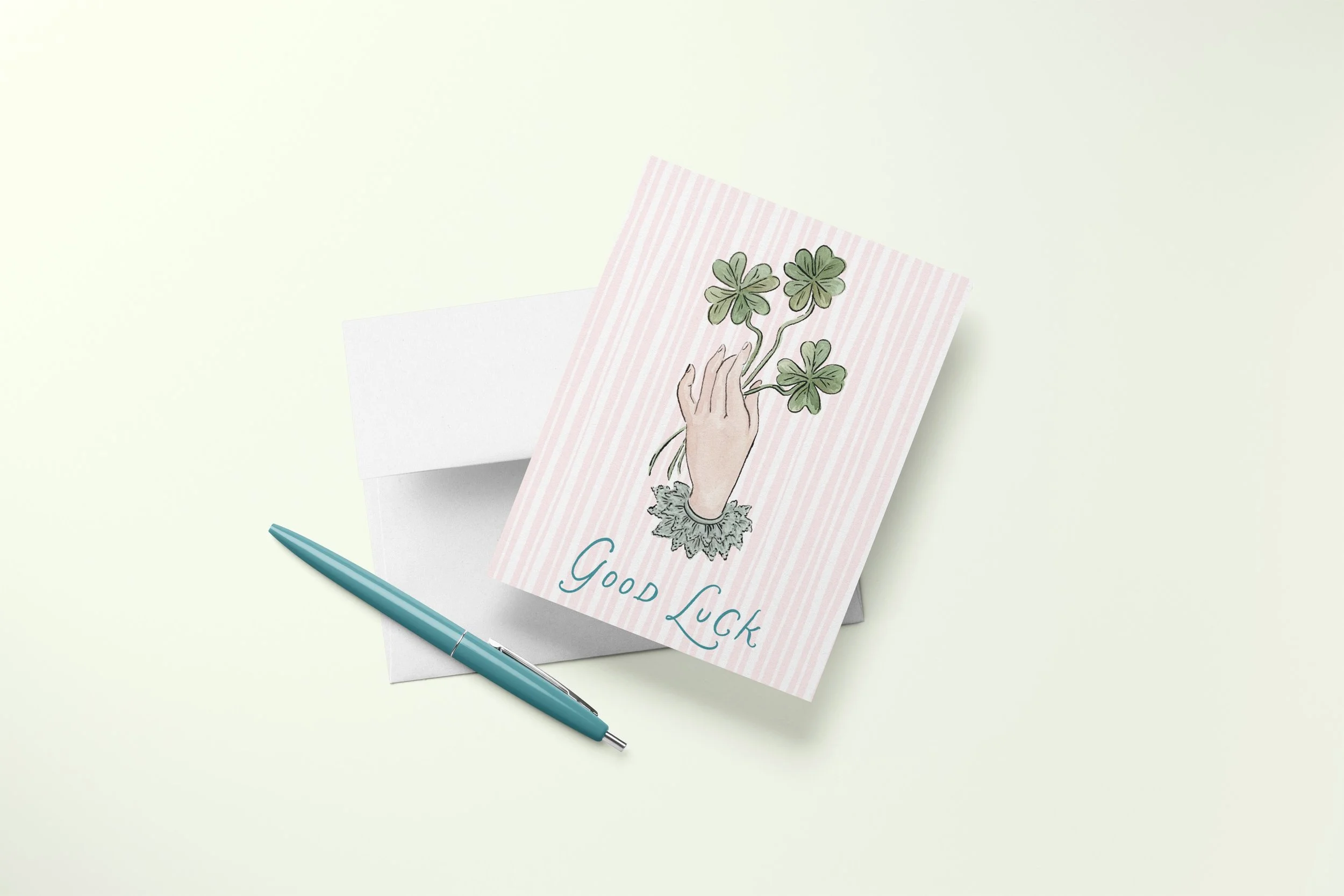 Good Luck Clovers Card Mock with Pen.jpg