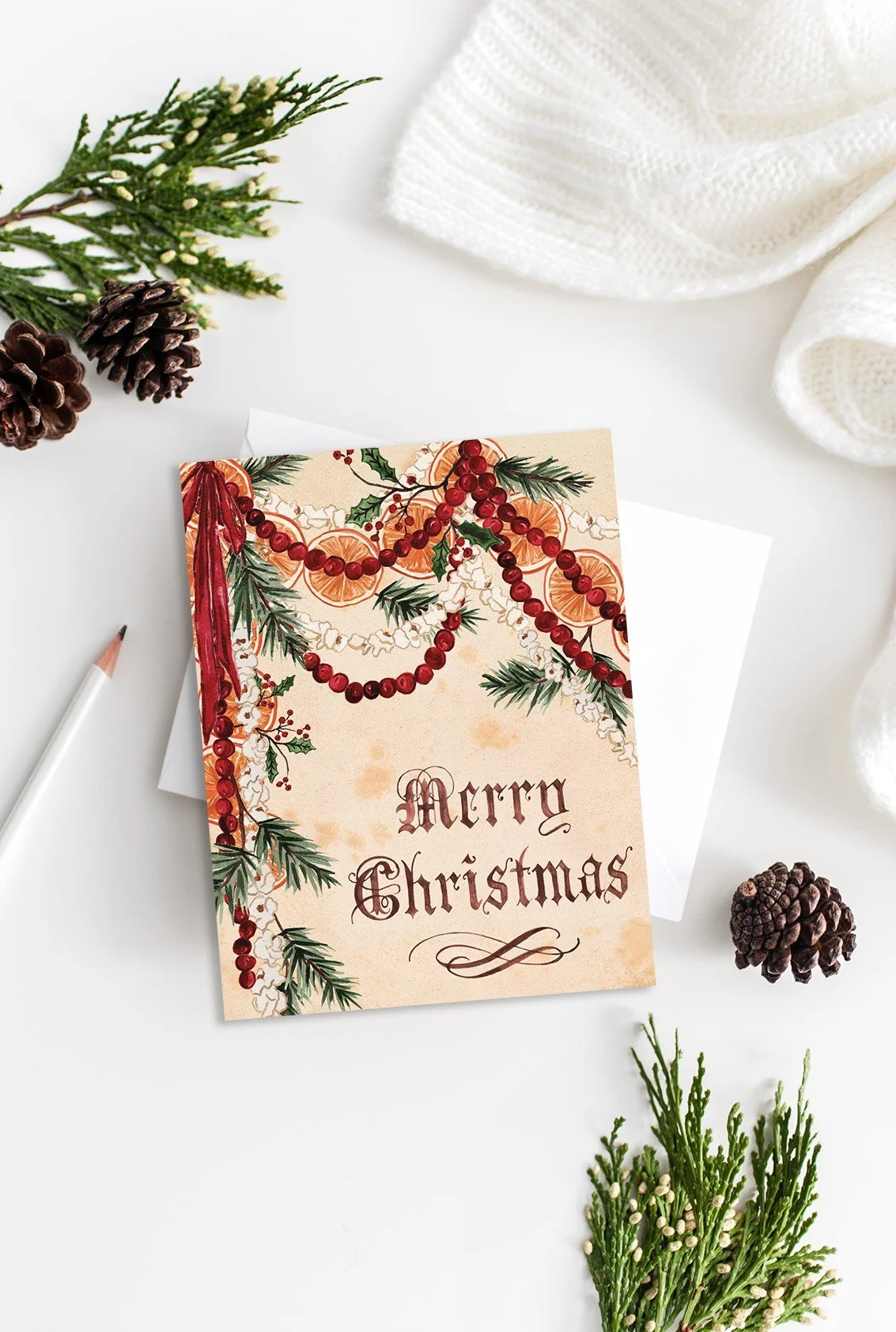 Cranberry Garland Merry Christmas Card by The Scribblist with pine cones and pine