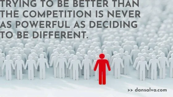 One man standing out in a sea of men - "Trying to be better than the competition is never as powerful as deciding to be different."