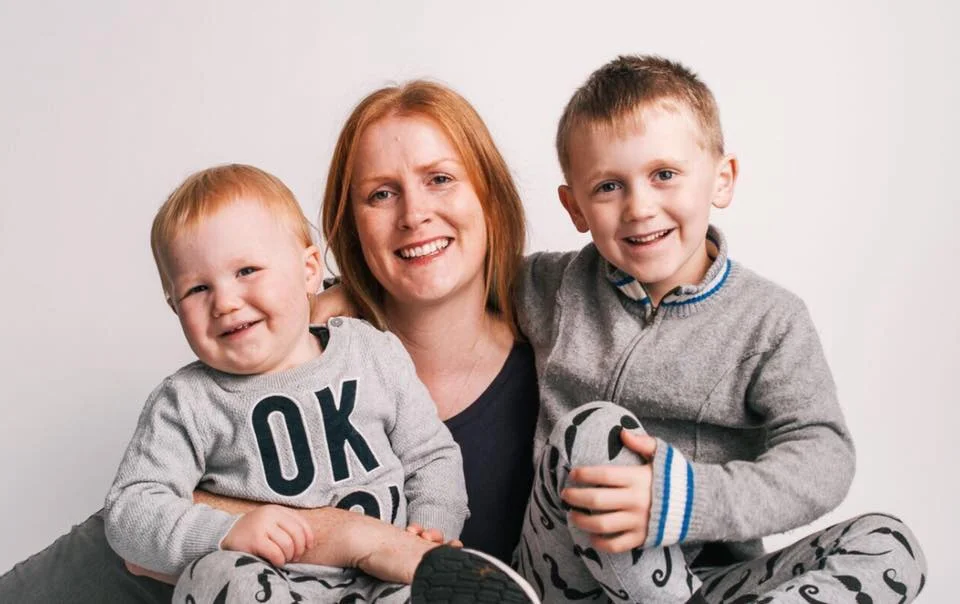 Joy with her two sons.
