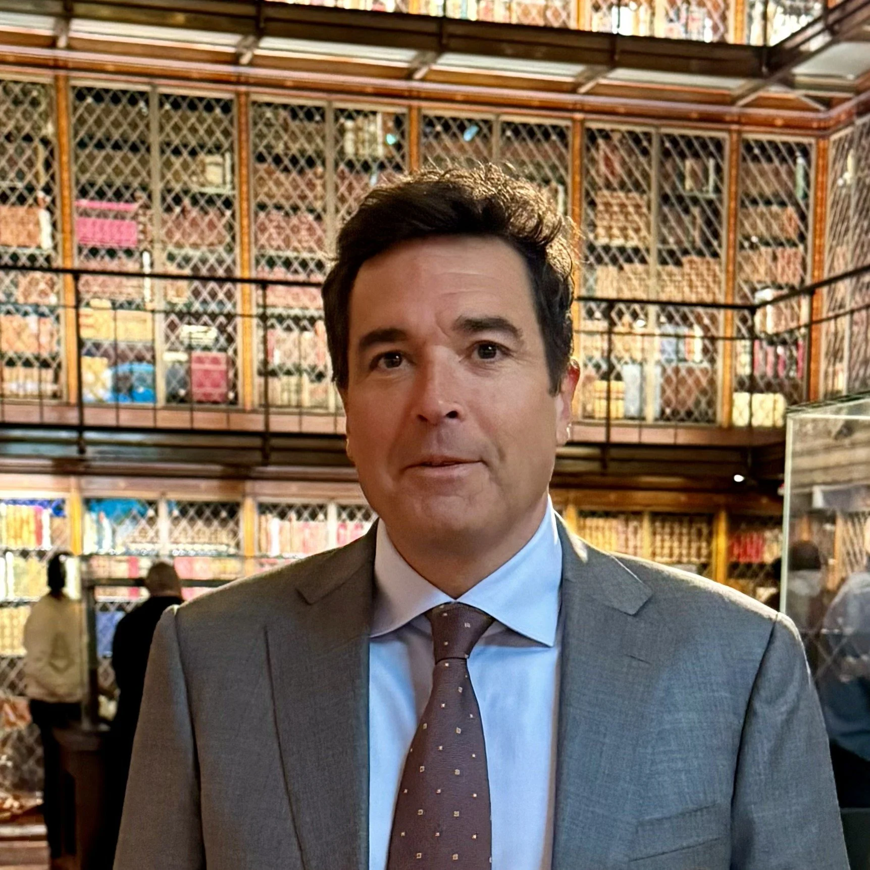 Conceptual Artist Adam Daley Wilson in Library as Adam Wilson is also a practicing appellate attorney in California Washington DC and Maine.