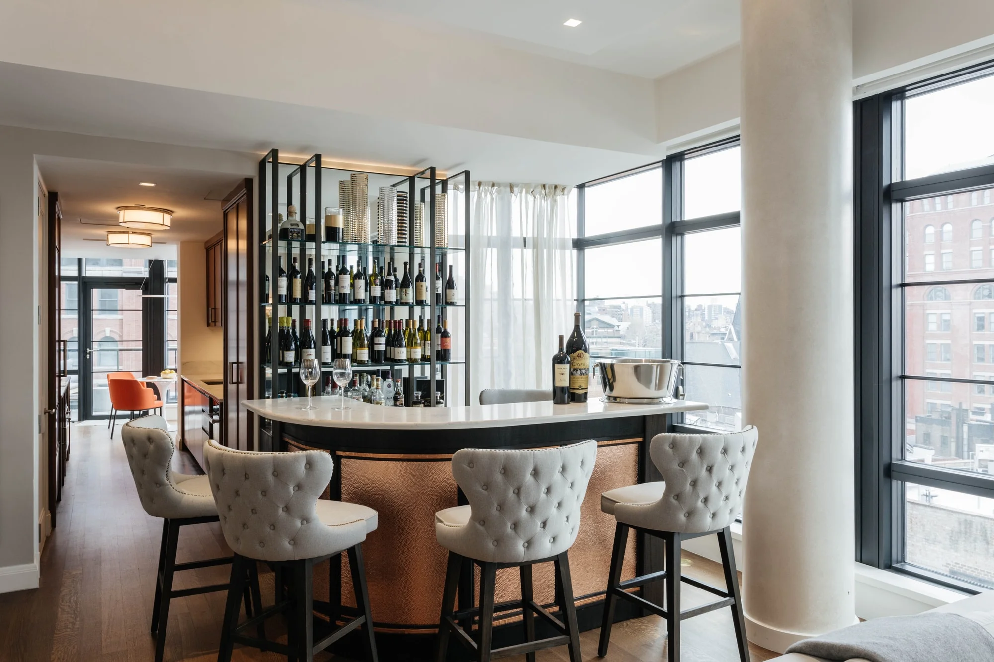 Bar area with custom metal built in bar shelves