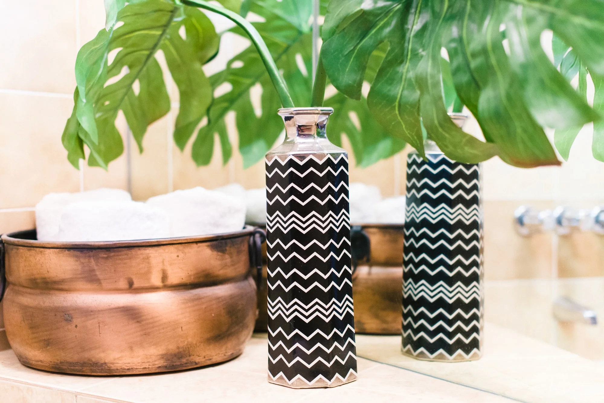 Bronze containers and green plants