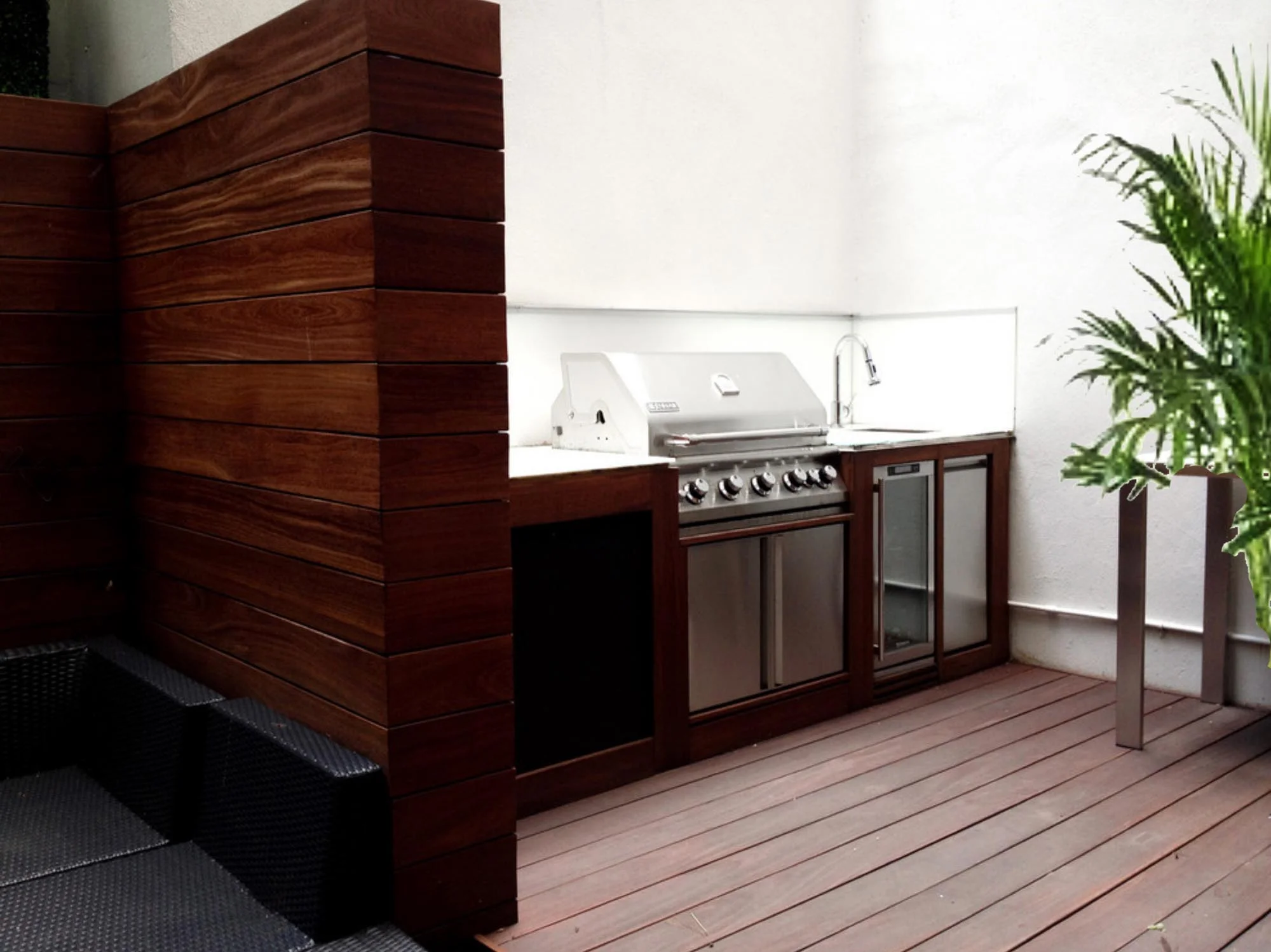 Outdoor cooking space with steel oven and sink