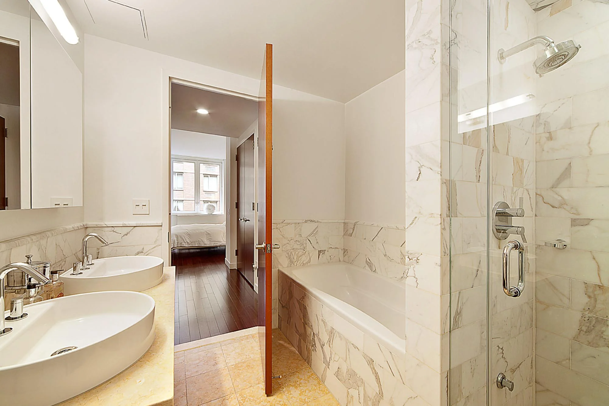 Bathroom with his and her sinks and walk in shower