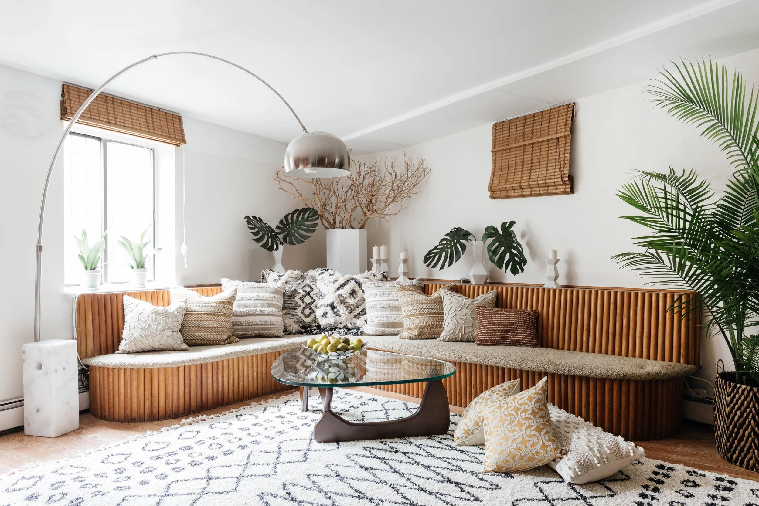 Living room space with custom built wooden sectional bench