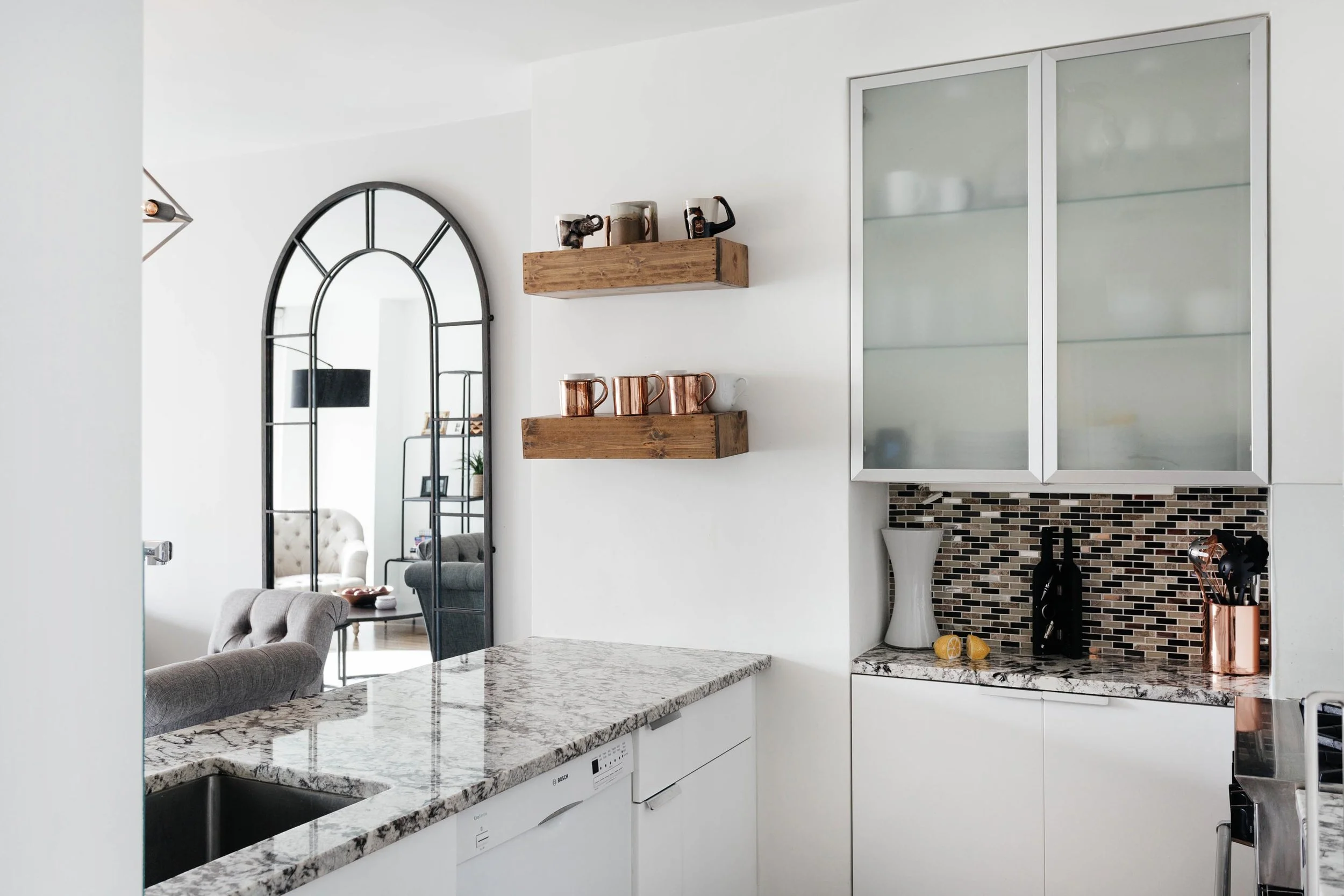 Kitchen area with grey marble counter top