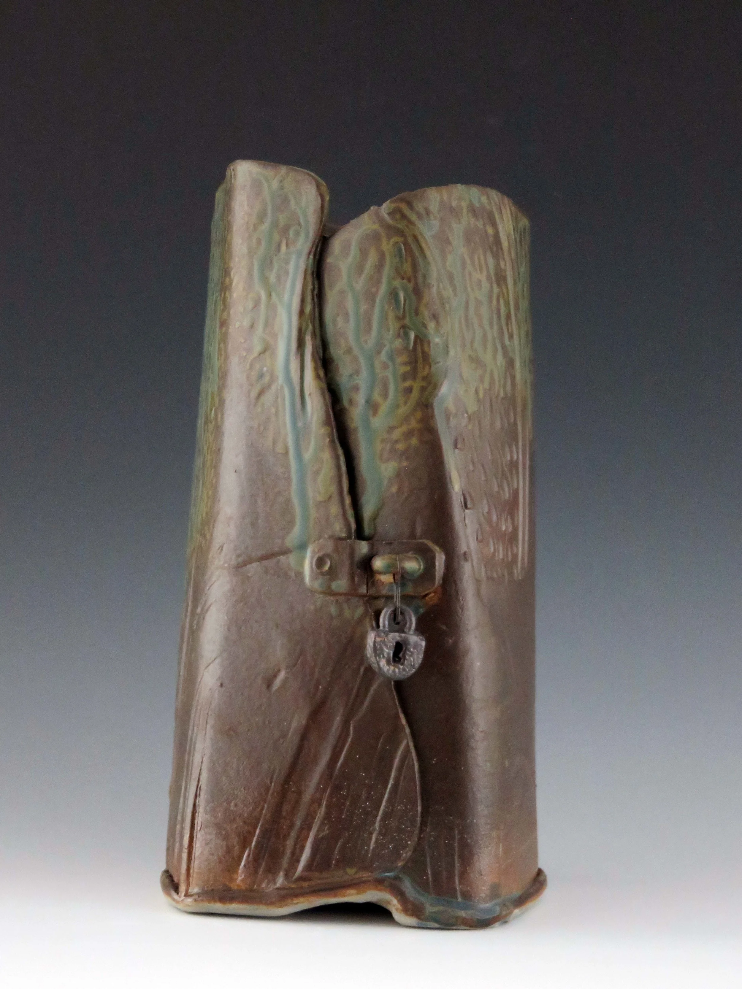 Hand built vessel with lock and key reverse.jpg