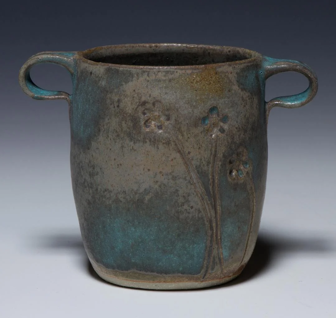 Small vase turquoise glaze.