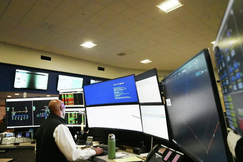  Makki Goodbee, a distribution security operator with National Grid, works at his station in National Grid’s Eastern Regional Control Center on Oct. 8, 2025, in Guilderland. National Grid is one of several utilities operating in New York state that a