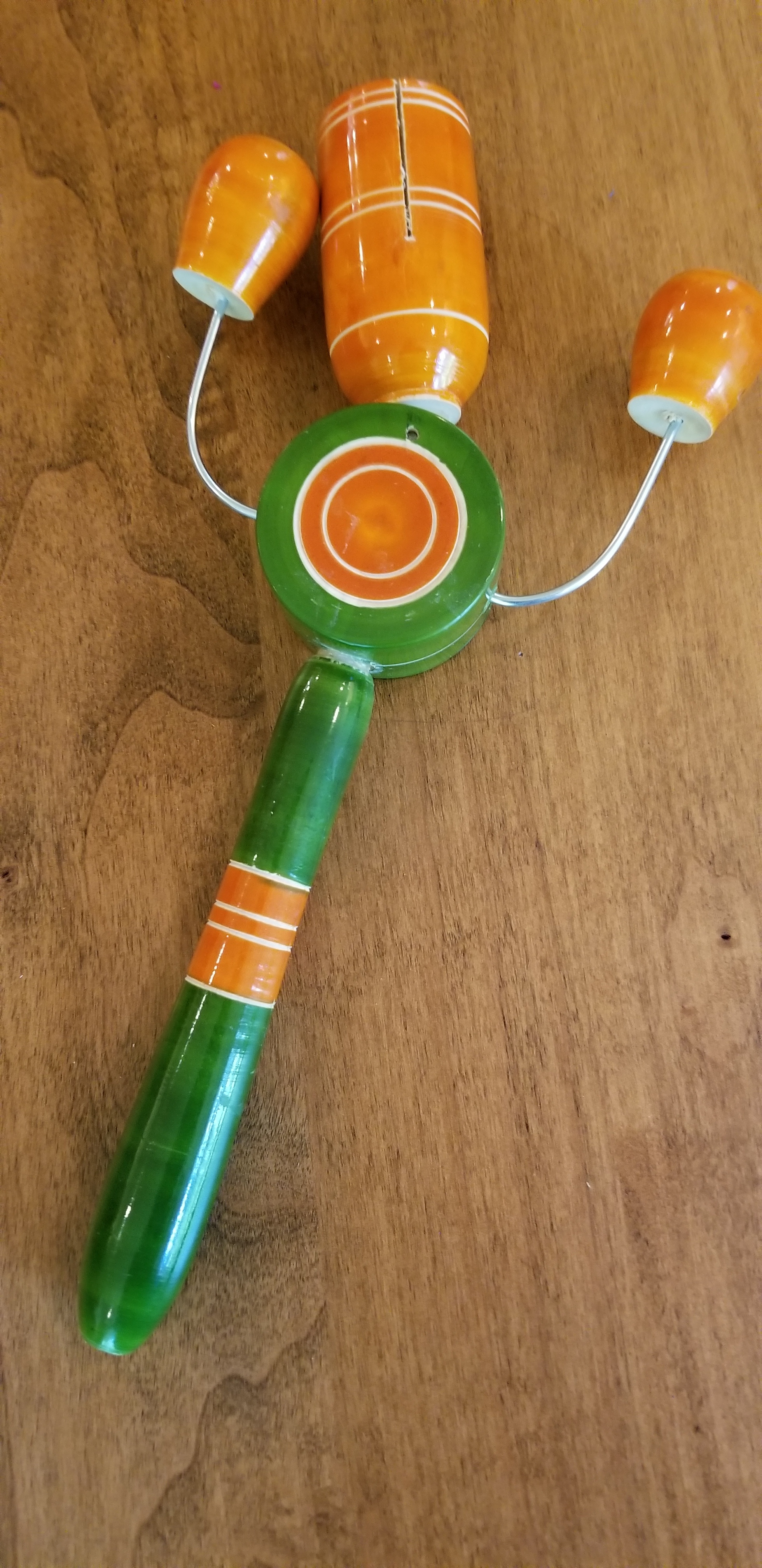 Hand-carved wooden rattle from Channapatna