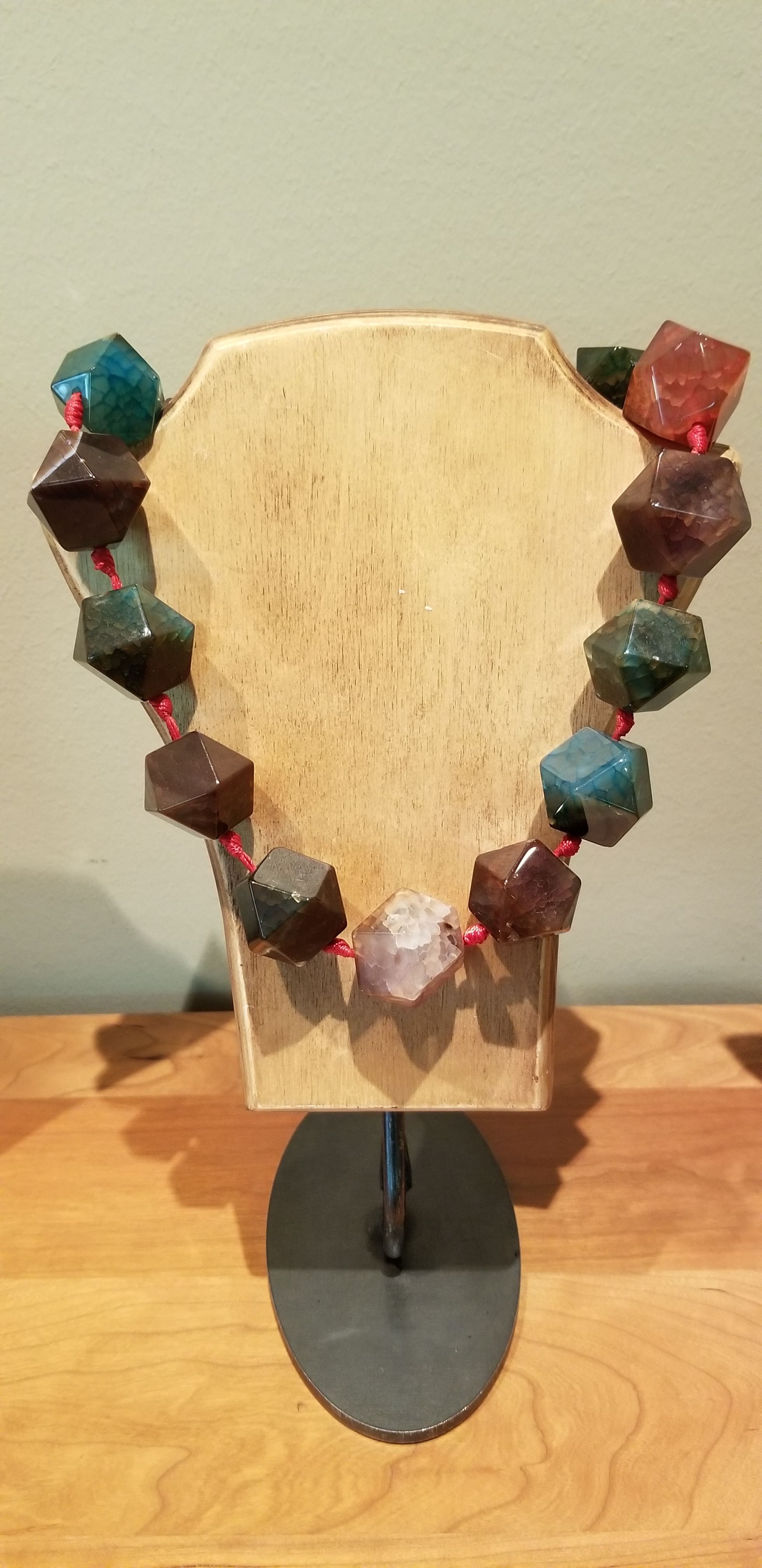 Hand-carved, polished natural stone necklace