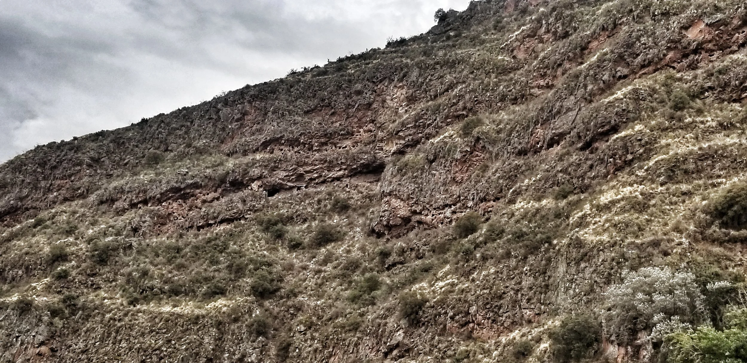 If you look closely you will see holes in the side of the mountain which is where the bodies were buried, many with wealth they had acquired in their lifetime. Grave robbers have been scouring these hills for years looking for treasure so most of these graves are now empty.