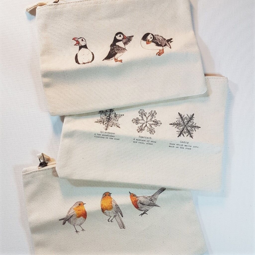 New pouch designs available this winter season 😊 
 . 
 . 
 . 
#pouch #accessorypouch #accessories #winter #autumn #art #artist #artproduct #dtgprinting #puffins #snowflakes #robins #scottish #gaelic #scottishgaelic #useful #artistmarket #christmasma