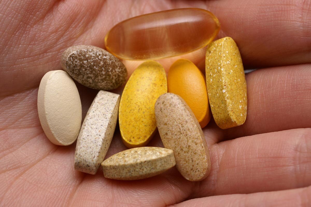Hand-Supplements-Vitamins.jpg