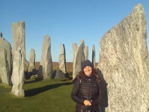 Liz Meadows standing at a sacred site