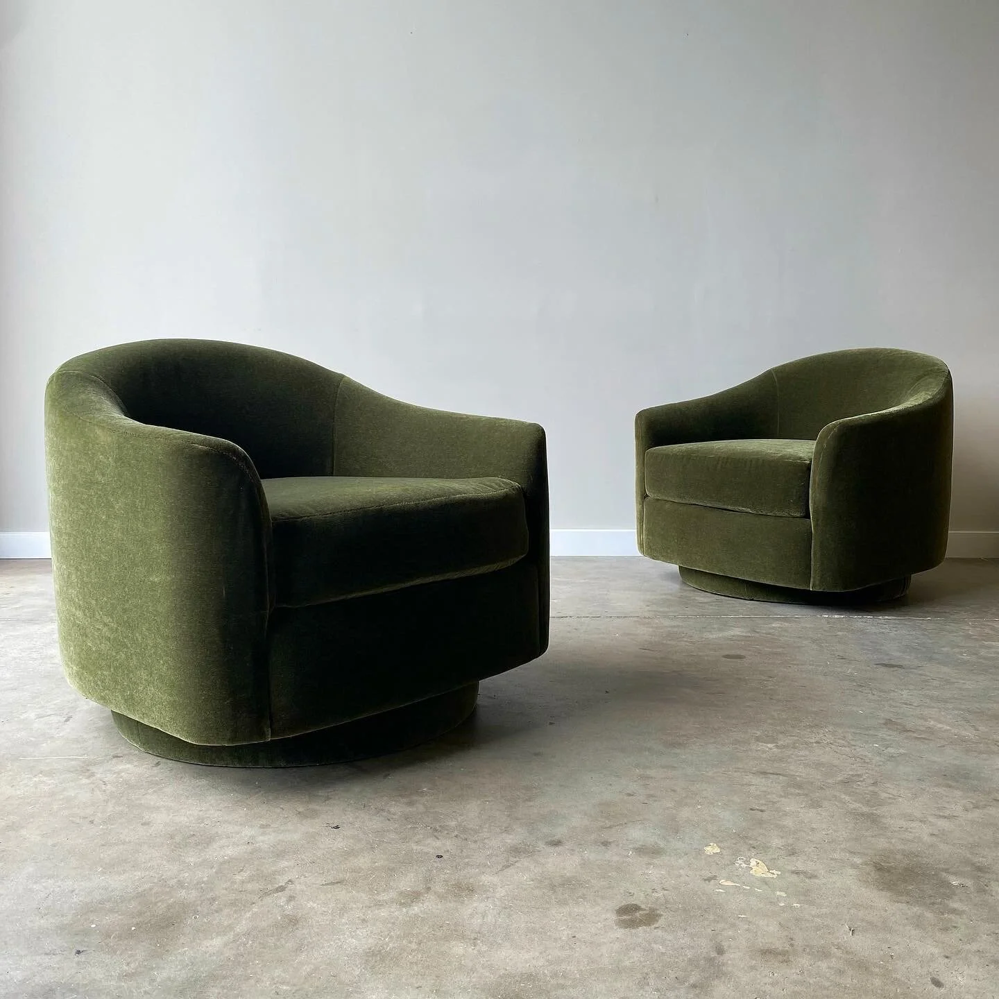 Vladimir Kagan style pair of swivel rockers dating to the 1970s. These have been restored in a luxurious mohair.  